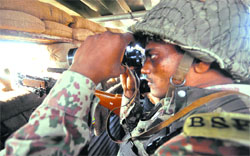 BSF men in a bunker along the border in Jammu