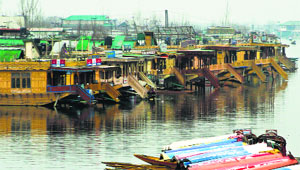 Court to rescue of Lake: Houseboats moored on the Dal Lake in Srinagar.