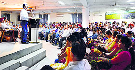 Sushil Gautam, joint secretary of the All-India Bank Employees Association, addresses the general body meeting in Ludhiana on Friday.