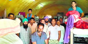Punjabi youths at their makeshift accomodation in Baghdad on Friday.