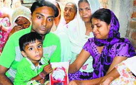 The victims parents in Gandhi Camp in Jalandhar on Friday.