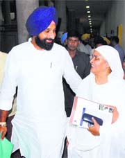 Revenue Minister Bikram Majithia and Bholath MLA Bibi Jagir Kaur come out from the Vidhan Sabha on Friday.