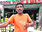 Ram Sewak, an eyewitness shows the crime spot at the liquor vend in Sector 70, Mohali