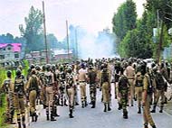 Security forces use teargas shells to disperse protesters in Anantnag district;