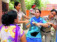 Members of the Unaided Staff of Aided Schools Front being taken away by the police personnel during their protest in Talwandi Sabo on Sunday.