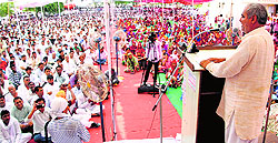Haryana Karamchari Sangh leader Dharambir Phogot addresses the gathering in Rohtak on Sunday