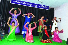 Students perform dance on the closing day of a workshop in Mandi on Sunday