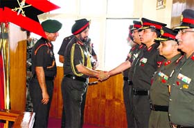 Army Chief Gen Bikram Singh shakes hands with Army officers at ARTRAC in Shimla on Sunday