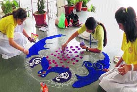 Mosaic: Students of Sanskriti KMV School participate in a Rangoli contest in Jalandhar on Sunday