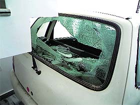 The car in which the officials were travelling was also damaged.