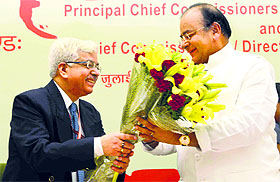 CBDT chairman RK Tiwari greets Finance Minister Arun Jaitley at the 30th annual conference of Principal Chief Commissioners and Director-Generals of the I-T Department in New Delhi on Monday.