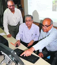 PU Vice-Chancellor AK Grover (centre), along with other professors, during the launch of online admission for PG courses at the USOL in Panjab University on Monday.