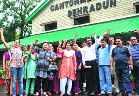 Protesters at the Cantt board office at Gadi Cantt in Dehradun on Monday