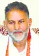 State BJP chief Ram Bilas Sharma addresses a press conference in Bhiwani on Monday. a tribune Photograph