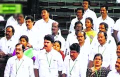 Members of the AIADMK in the Lok Sabha in New Delhi on Monday. PTI Photo/TV GRAB