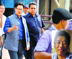 Minister of State for Home Kiren Rijiju at the AIIMS where Akha Salauni (inset) was brought dead on Monday
