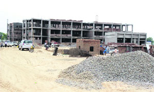 An incomplete structure on the campus of the Residential School for Meritorious Students in Bathinda on Tuesday. 
