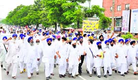 HSGPC supporters during a protest march in Karnal. They demanded removal of Akali task force members from gurdwaras of the state on Tuesday