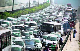 Never-ending line: Vehicles stuck in a traffic jam on NH-8 in Gurgaon on Tuesday