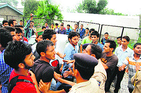SFI and ABVP activists clash on the Government College campus in Dharamsala on Tuesday.