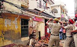 A view of the collapsed under-construction house in Gopal Nagar in which the owner died after getting buried under the falling debris in Jalandhar on Tuesday