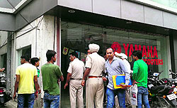 A showroom was sealed by the MC staff in Jalandhar on Tuesday