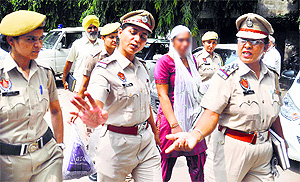 Policewomen take the constables wife to the Police Commissioner in Ludhiana. 
