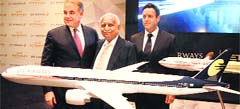 Jet Airways chairman Naresh Goyal (C) with Etihad president James Hogan (L) and Jet Airways CEO-designate Cramer Ball in New Delhi on Wednesday. Tribune photo: Mukesh Aggarwal