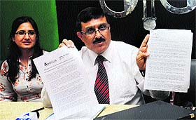 New Zealand licensed immigration adviser Amar Manchanda addresses mediapersons in Chandigarh on Wednesday.