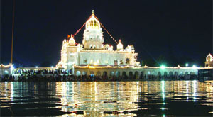 An illuminated Gurdwara Bangla Sahib on the birth anniversary of Sikh Guru Harkrishan Sahib in New Delhi on Wednesday.