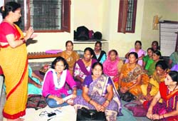 Members of Janwadi Mahila Samiti in Dehradun on Wednesday. a tribune photograph