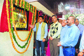 Urban Development Minister Sudhir Sharma inaugurates an MC rest house in Shimla