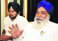 Balkar Singh (right), president, Gurdwara Manji Sahib, talks to the media in Karnal on Wednesday