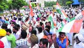Up in arms: Congress workers hold protest against the SAD-BJP government outside the DC office