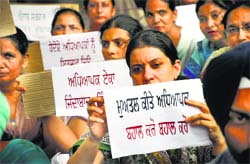 Teachers protest outside the Mini-Secretariat in Ludhiana on Wednesday. Tribune Photo: Himanshu Mahajan