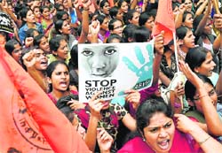 Members of the Akhil Bharatiya Vidyarthi Parishad stage a protest in Bengaluru on Wednesday. PTI