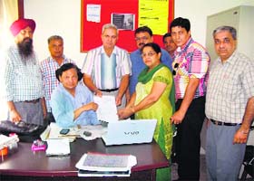 Civil Hospital employees submit a memorandum to the Civil Surgeon in Fazilka on Wednesday