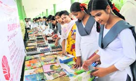 Students at a book exhibition at Shivalik Public School in Mohali on Thursday.