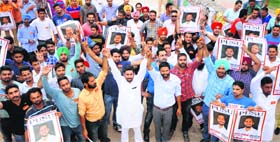 PUSU supporters with their newly appointed campus chairman Karni Kullar (centre  in white kurta) at Panjab University in Chandigarh on Thursday.