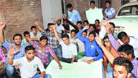 INSO activists stage a dharna in front of the Executive Engineers office at Panjab University.