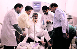 Chief Minister Harish Rawat during his check-up at Doon MRI Centre Hospital in Dehradun on Thursday. 