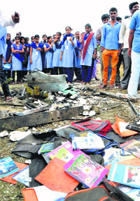 Books and bags of students at the scene of accident at Masaipet in Medak on Thursday