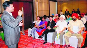 Rakesh Dahiya, Smart Class Regional CEO-North, addresses a gathering of Principals of private schools at a hotel in Amritsar on Friday.