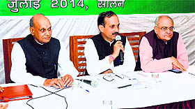 Former Chief Minister PK Dhumal, state BJP president Satpal Satti and party in-charge Balbir Punj at the state-level core committee meeting in Solan on Friday.