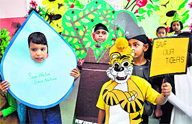 School students during an awareness programme on water conservation in Patiala on Friday. 