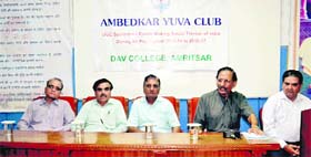 A seminar on consumer rights and legal remedies underway at DAV College in Amritsar on Saturday.