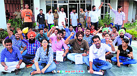 NSUI workers protest in front of the dental college at Panjab University in Chandigarh 