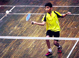 A player hits a shot during the Ninth Ashwani Gupta Memorial District Badminton Championship at the Tau Devi Lal Stadium in Panchkula on Saturday. 
