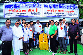 Indain Red Cross Society secretary Haridwar unit Dr Naresh Chaudhari (centre) with his team in Haridwar on Saturday.