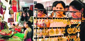 Women take a look at handbags; and (right) earrings put on display during a wedding exhibition in Ludhiana.